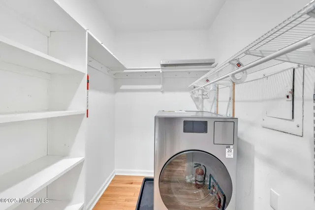 a view of entryway with washer and dryer