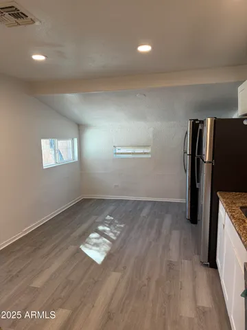 a view of an empty room and window