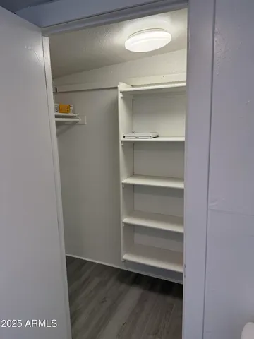 a view of a house with a yard and garage