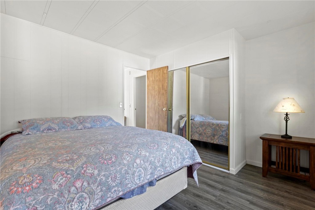 75 Obert Drive Bangor, CA 95914 - Photo 27 of 52 a bedroom with a bed and a chandelier