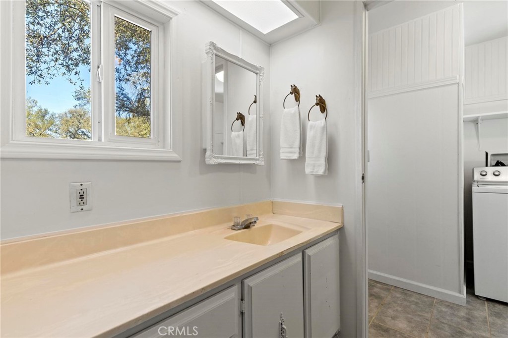 75 Obert Drive Bangor, CA 95914 - Photo 28 of 52 a bathroom with a sink and a mirror