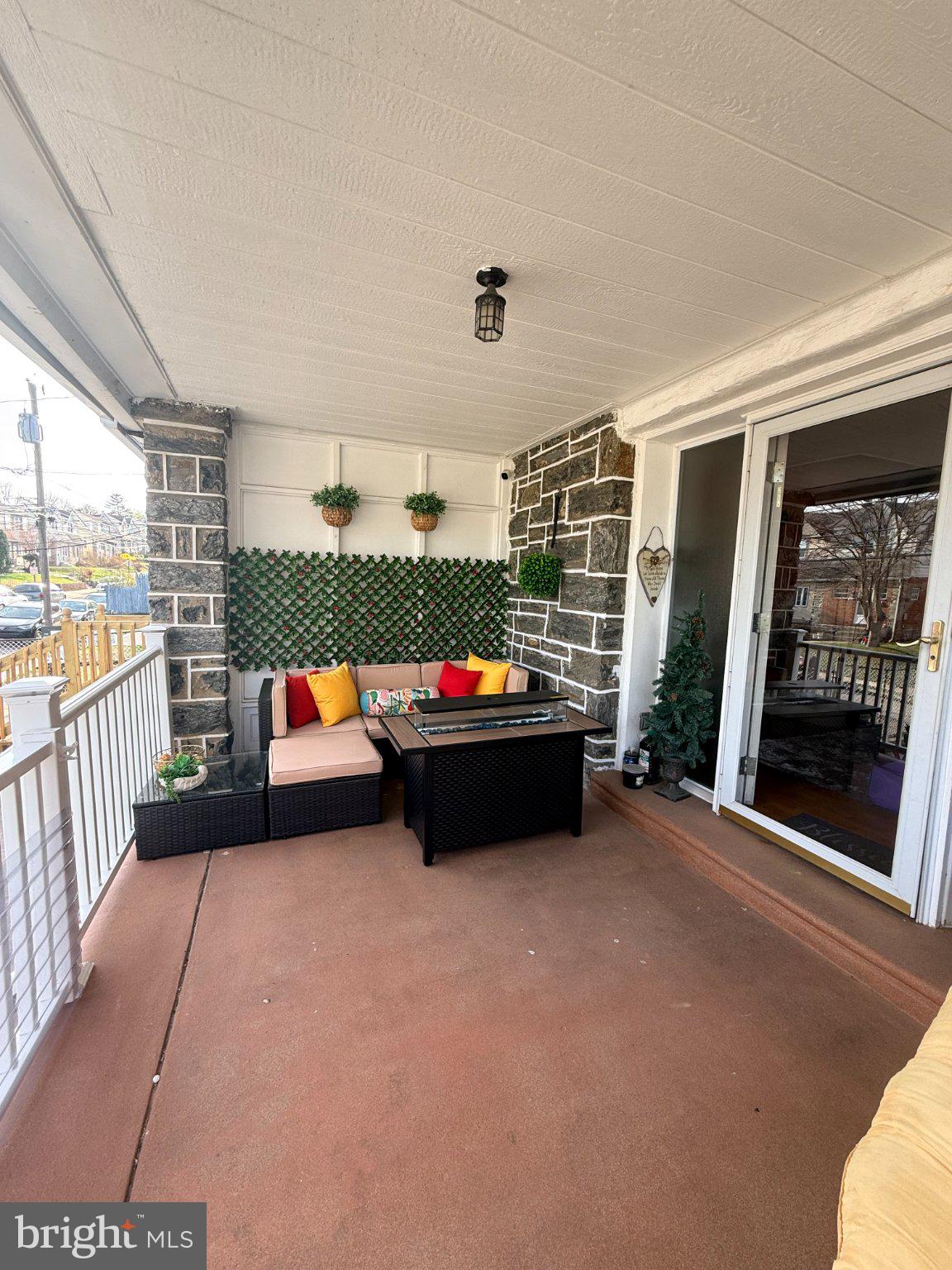 4027 Vernon Road Drexel Hill, PA 19026 - Photo 4 of 19 Charming porch with cozy seating.