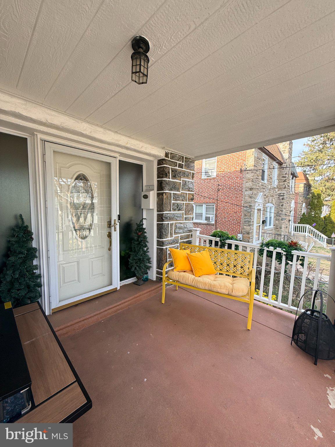 4027 Vernon Road Drexel Hill, PA 19026 - Photo 5 of 19 Charming porch with vibrant accents.
