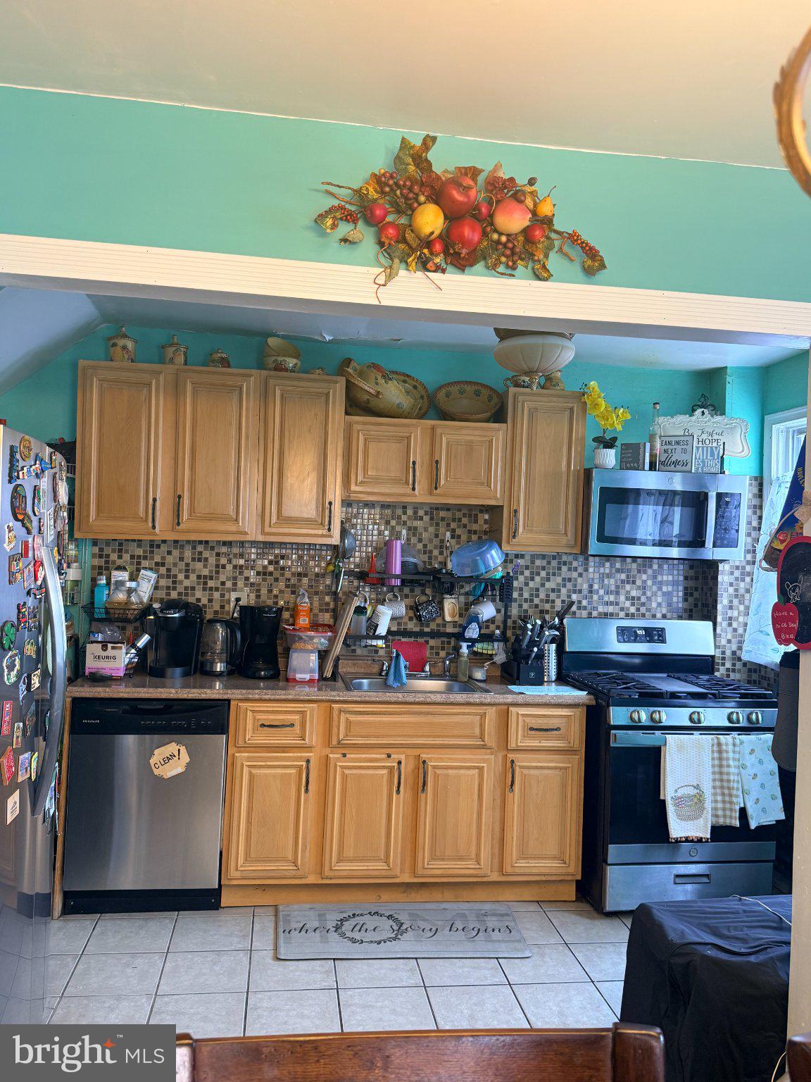 4027 Vernon Road Drexel Hill, PA 19026 - Photo 9 of 19 Charming kitchen with vibrant decor.