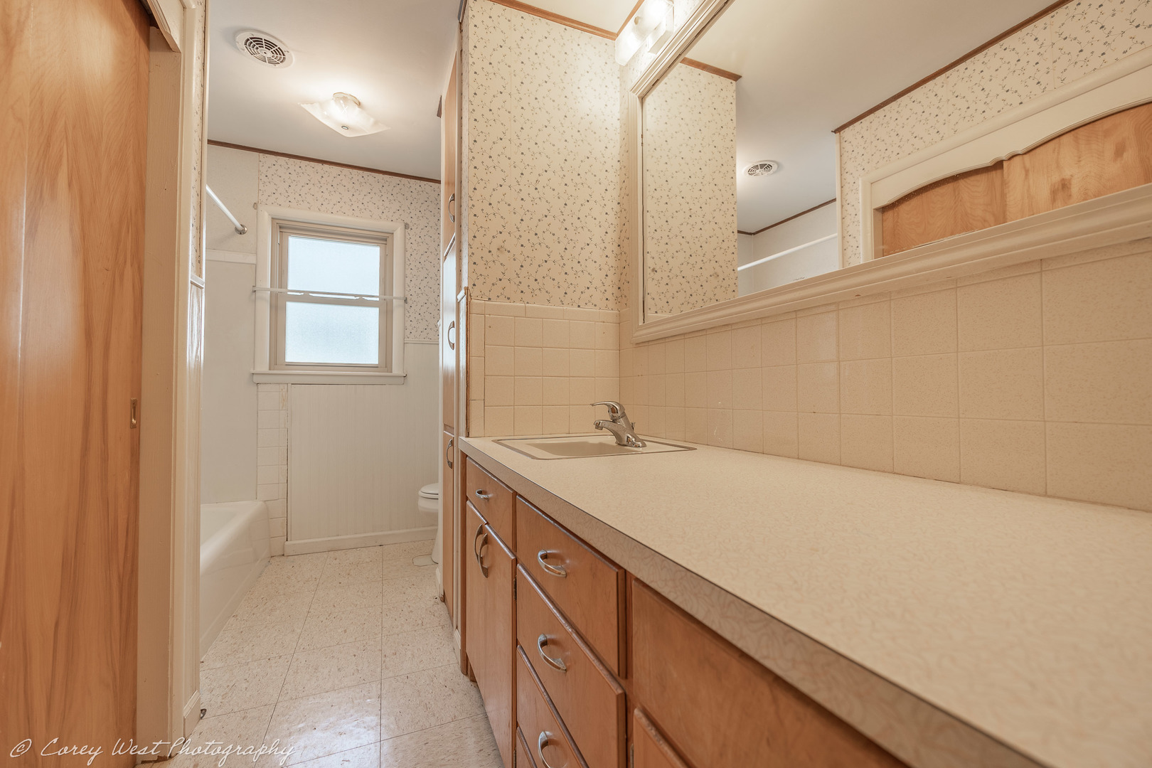 1233 Wild Street Sycamore, IL 60178 - Photo 11 of 18 a bathroom with a sink and a mirror