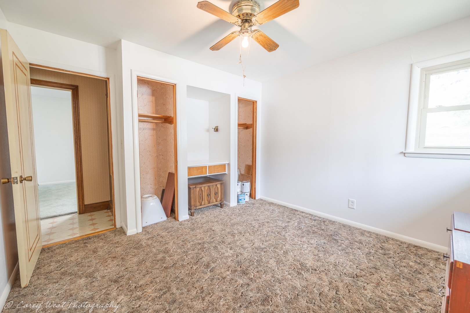 1233 Wild Street Sycamore, IL 60178 - Photo 13 of 18 an empty room with closet and a chandelier fan
