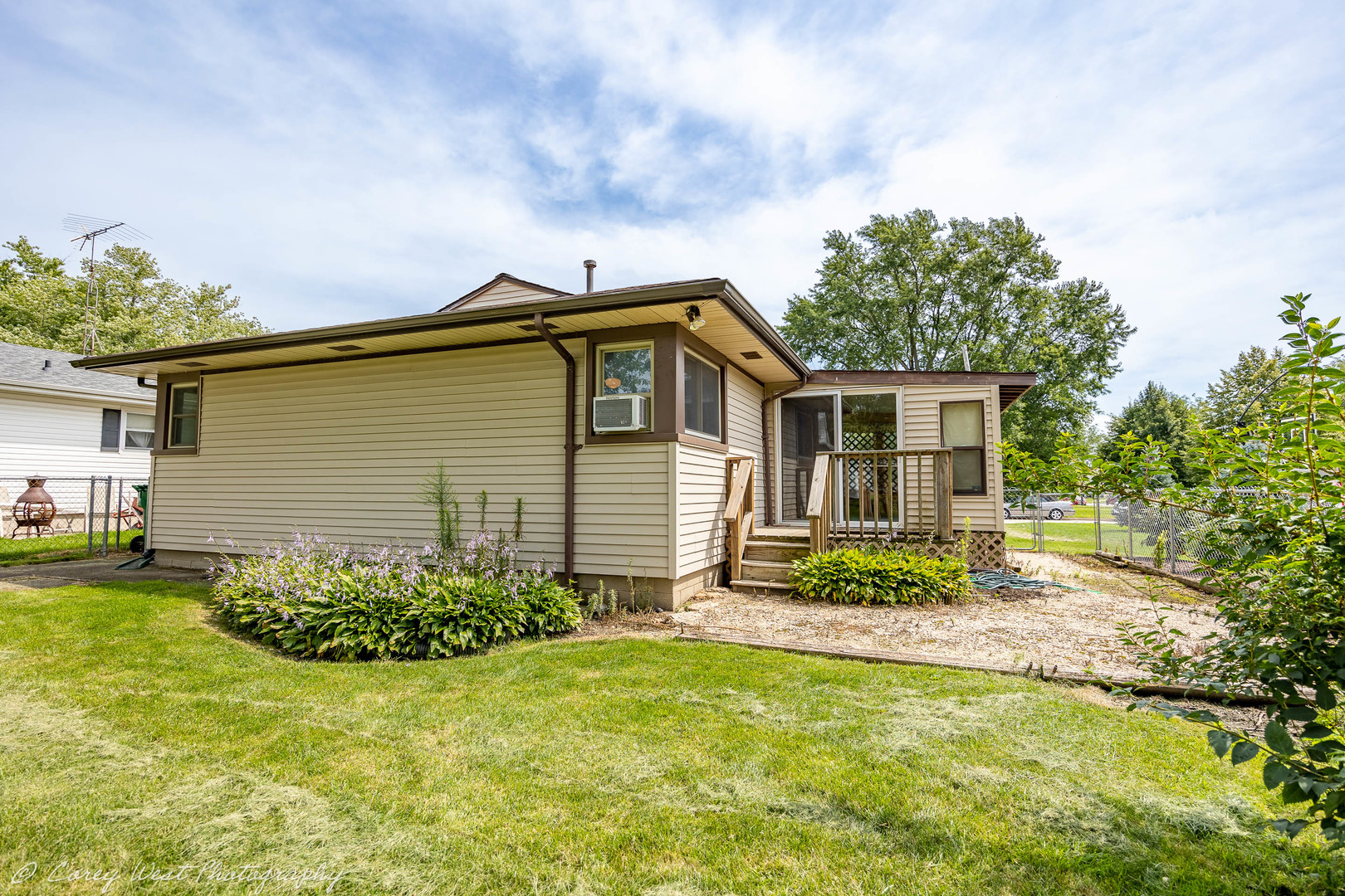 1233 Wild Street Sycamore, IL 60178 - Photo 15 of 18 a backyard of a house with potted plants