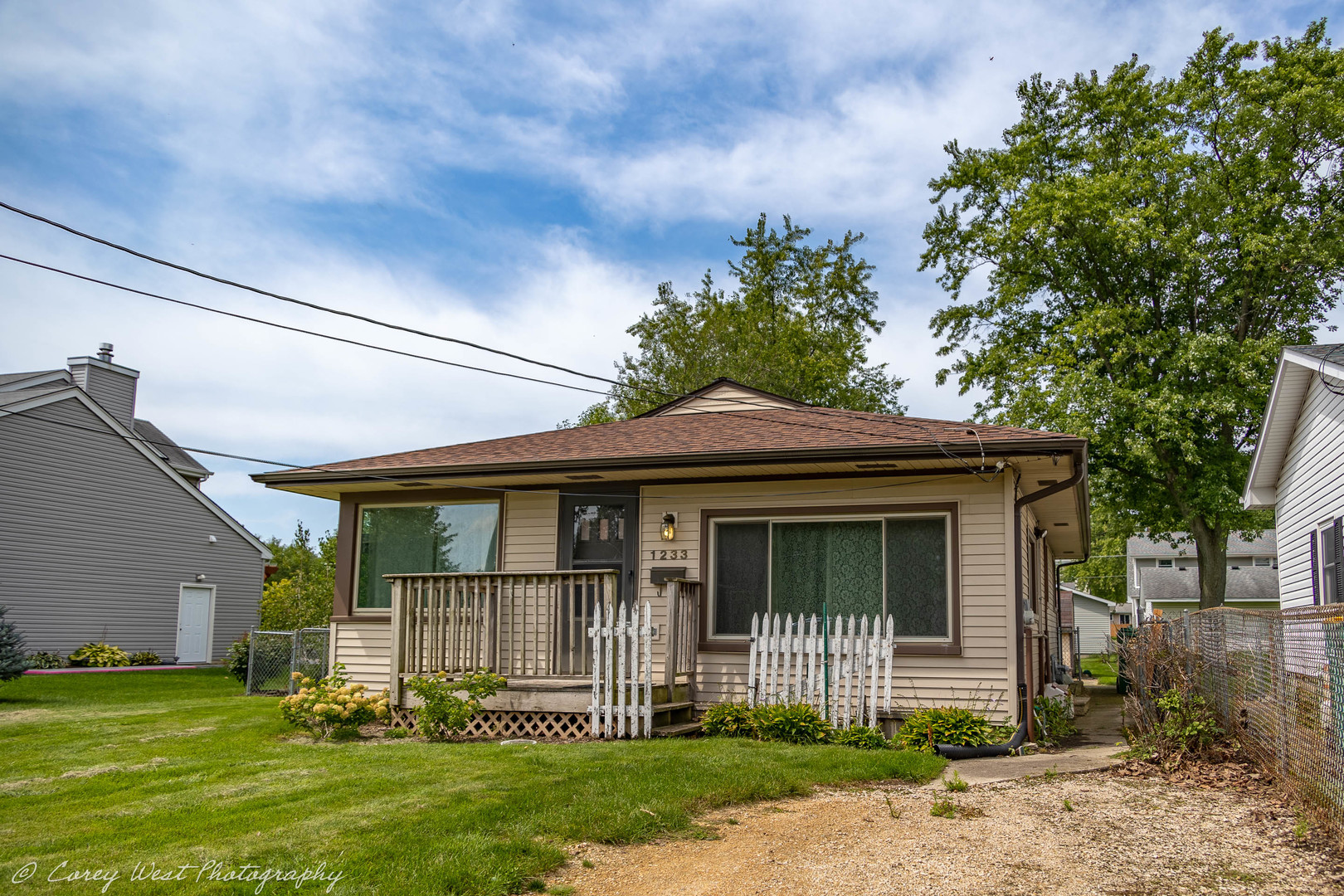 1233 Wild Street Sycamore, IL 60178 - Photo 18 of 18 a front view of a house with a garden