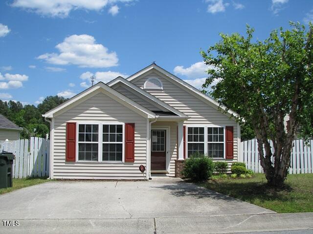 4419 Nightfall Court Durham, NC 27713 - Photo 2 of 17 a front view of a house with garden