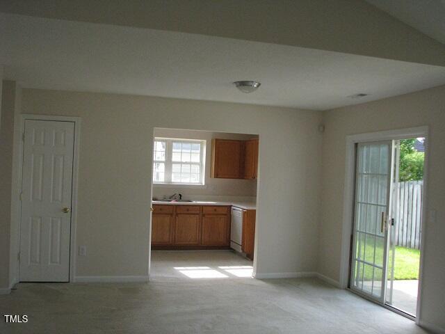4419 Nightfall Court Durham, NC 27713 - Photo 4 of 17 an empty room with windows