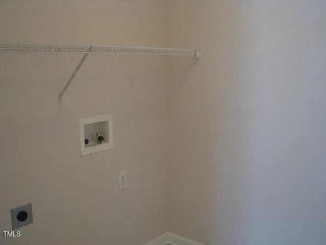 a view of small space with empty racks on the wall