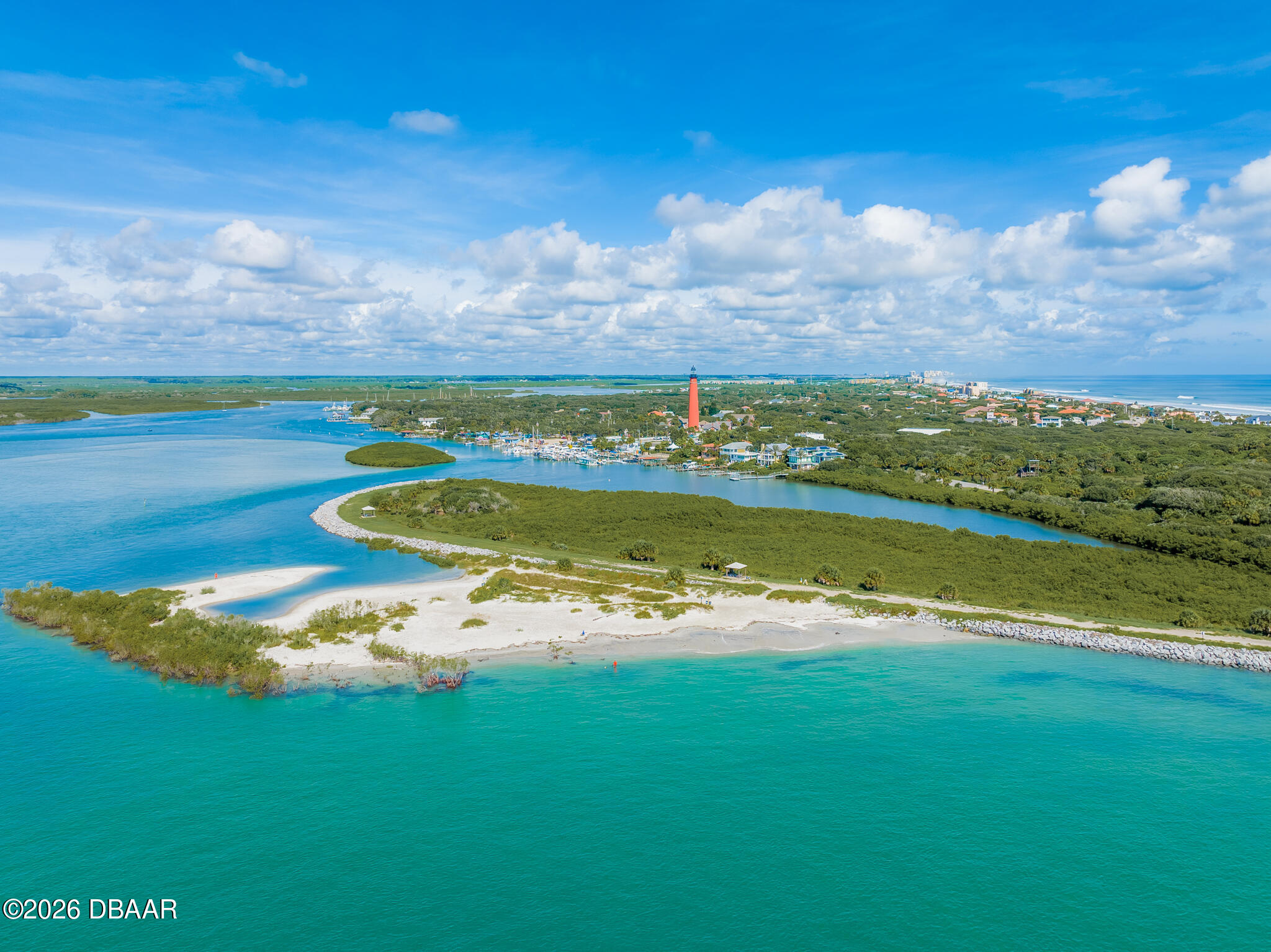 4873 South Atlantic Avenue Ponce Inlet, FL 32127 - Photo 15 of 28 a view of a lake with a city