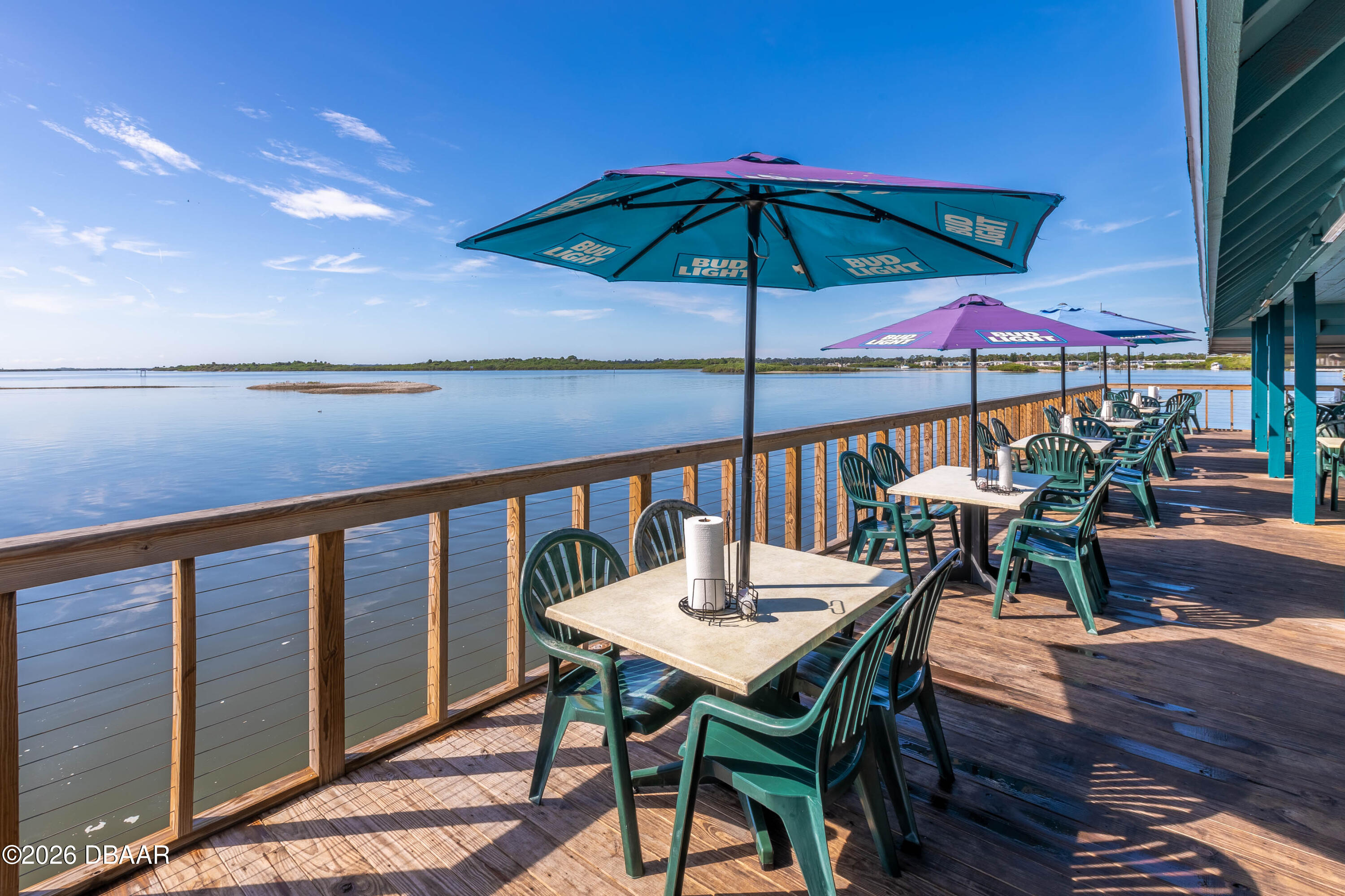 4873 South Atlantic Avenue Ponce Inlet, FL 32127 - Photo 23 of 28 a view of balcony with furniture and umbrella