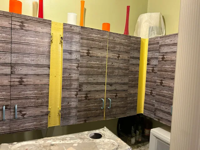 a bathroom with a shower and a sink