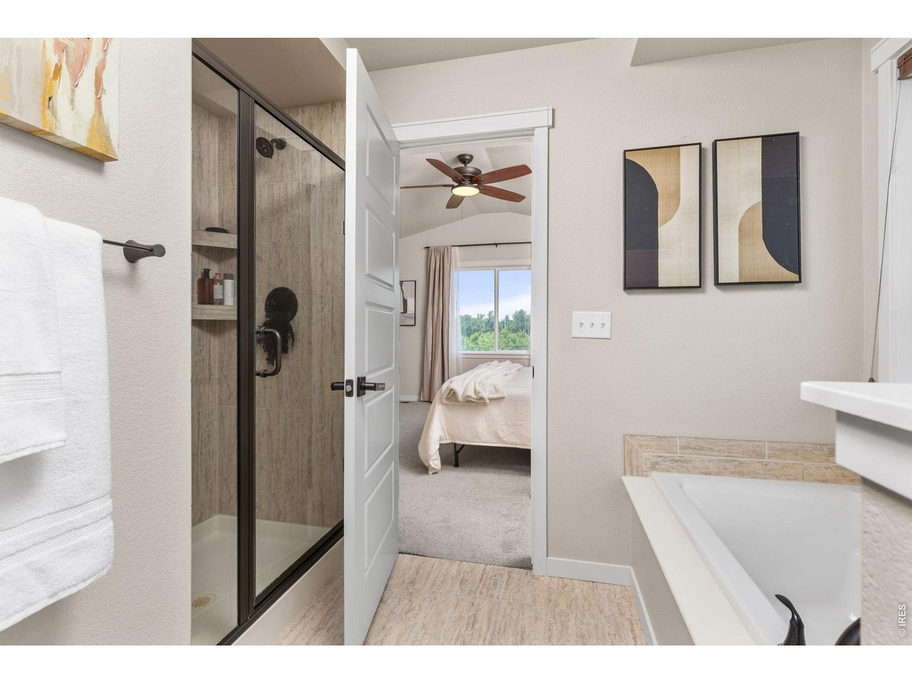 2905 68th Avenue Greeley, CO 80634 - Photo 19 of 40 Primary bathroom with seperate shower and bath tub.