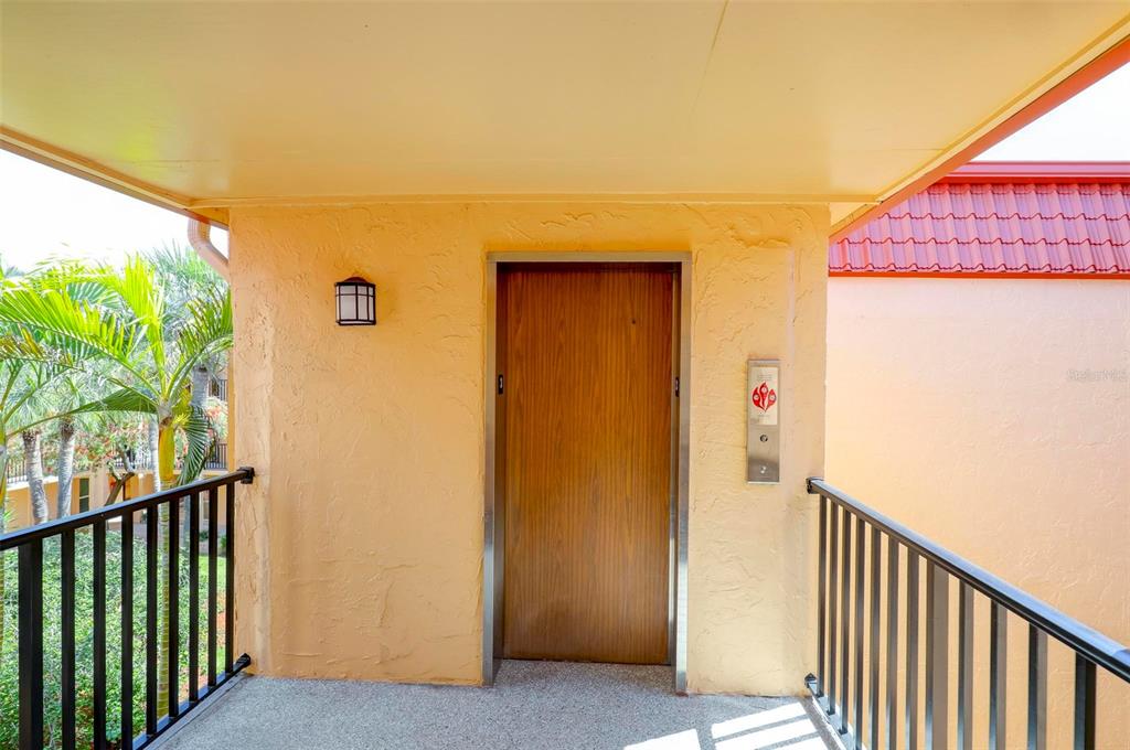 8911 Blind Pass Road, Unit 321 St. Pete Beach, FL 33706 - Photo 43 of 55 a view of a balcony