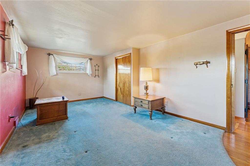1237 Circle Drive Pittsburgh, PA 15221 - Photo 13 of 40 a living room with furniture and a window