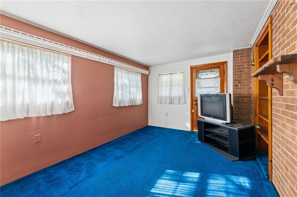 1237 Circle Drive Pittsburgh, PA 15221 - Photo 22 of 40 a view of a livingroom with wooden floor and furniture