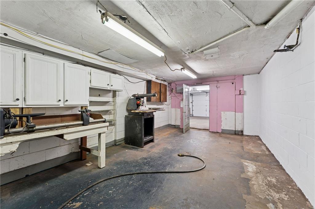 1237 Circle Drive Pittsburgh, PA 15221 - Photo 39 of 40 a kitchen with refrigerator and cabinets