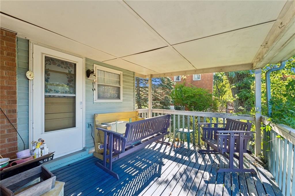1237 Circle Drive Pittsburgh, PA 15221 - Photo 5 of 40 a view of a balcony with wooden floor