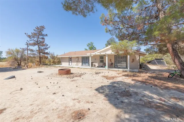 view of a house with a yard