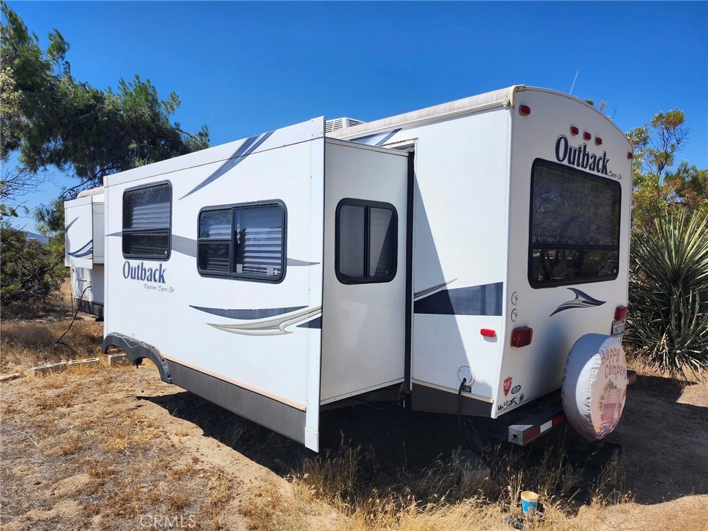 38855 Howard Road Anza, CA 92539 - Photo 7 of 54 a front view of a house with entryway