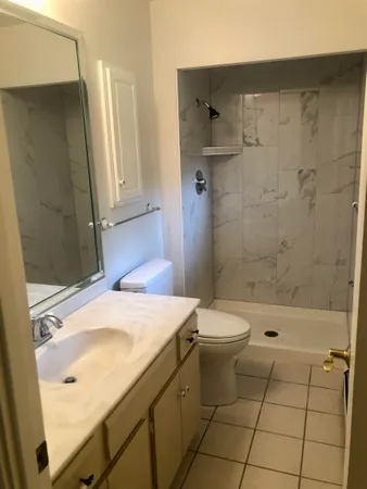 an empty room with closet area