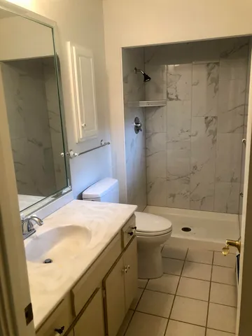 an empty room with closet area