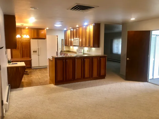a view of kitchen with a sink