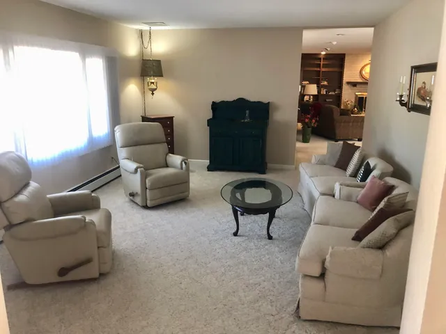 a living room with furniture and a couch