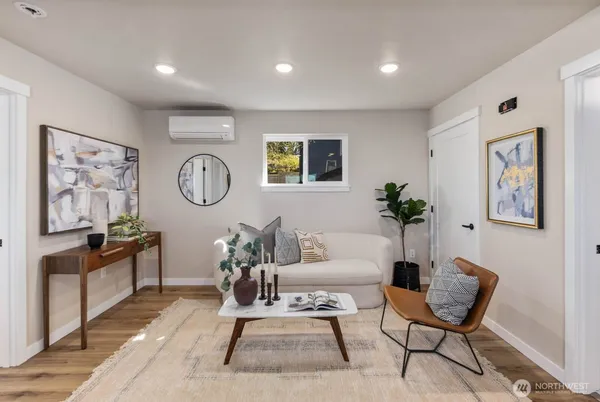 a living room with furniture and window