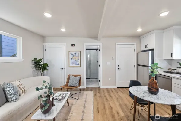a living room with furniture and a table