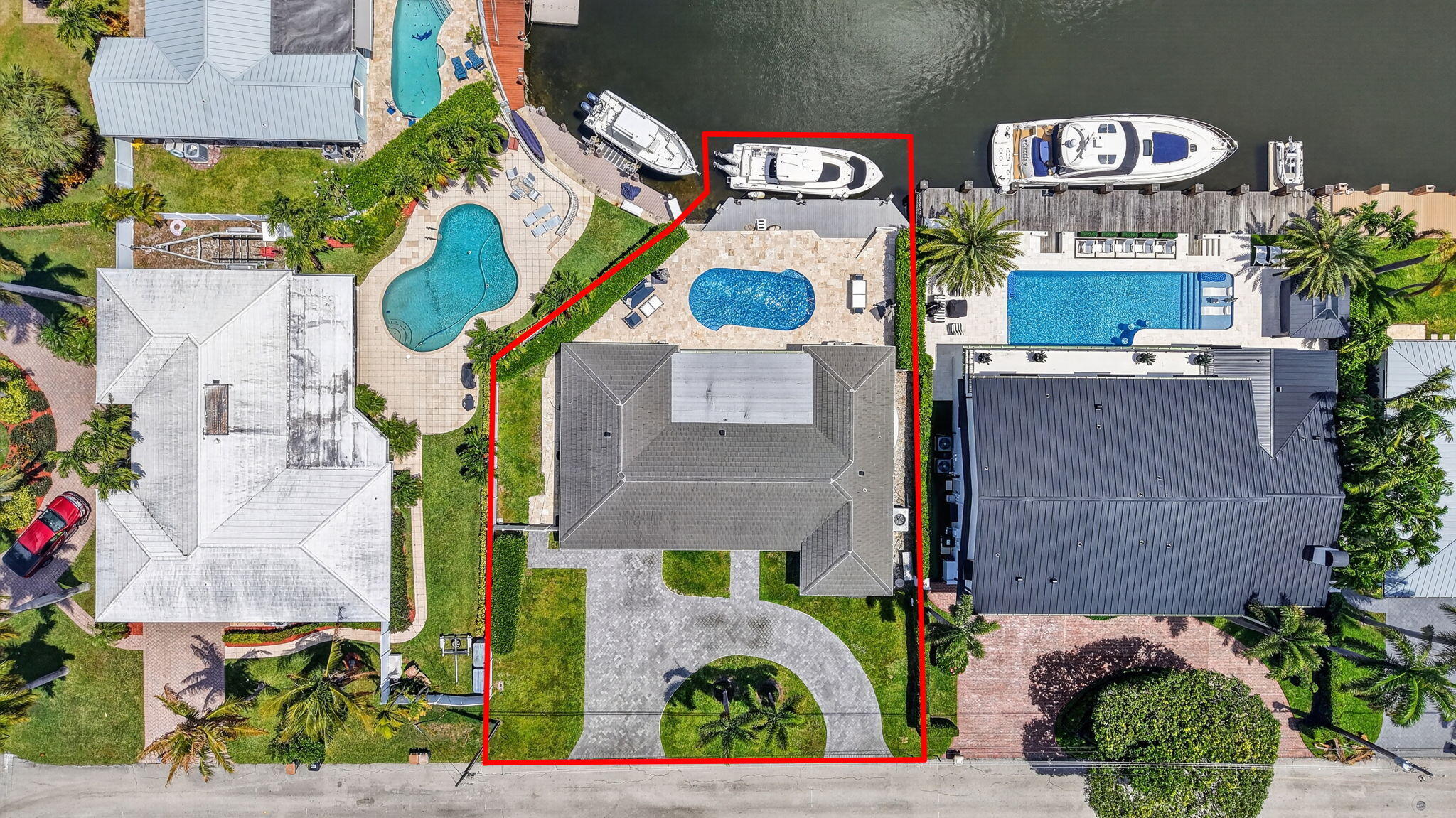 4460 Northeast 26th Avenue Lighthouse Point, FL 33064 - Photo 41 of 55 an aerial view of residential houses with outdoor space and street view