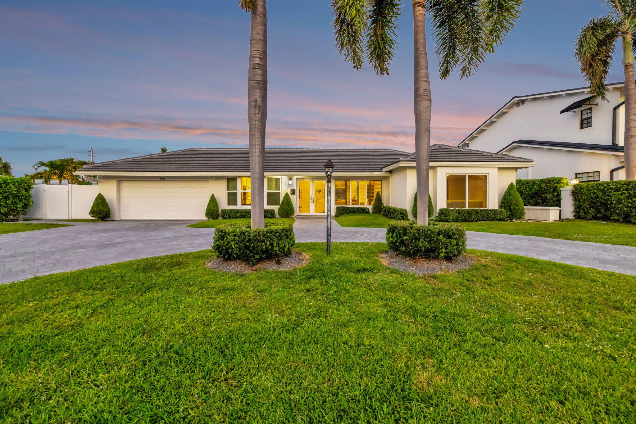 4460 Northeast 26th Avenue Lighthouse Point, FL 33064 - Photo 46 of 55 a view of a house with a big yard