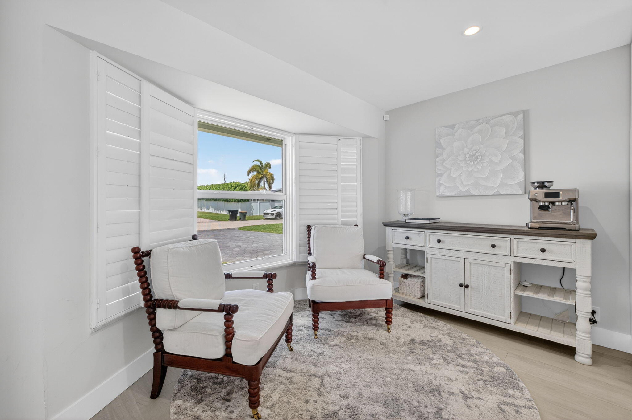 4460 Northeast 26th Avenue Lighthouse Point, FL 33064 - Photo 10 of 55 a living room with furniture and a dresser