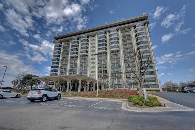front view of a house with a garden
