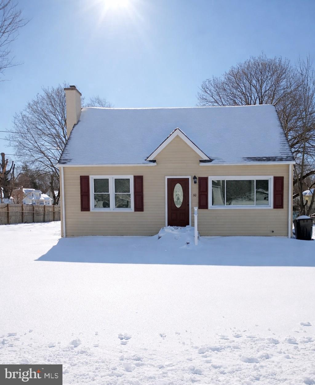 60 Roberts Avenue Clayton, NJ 08312 - Photo 1 of 3 a front view of a house with a yard