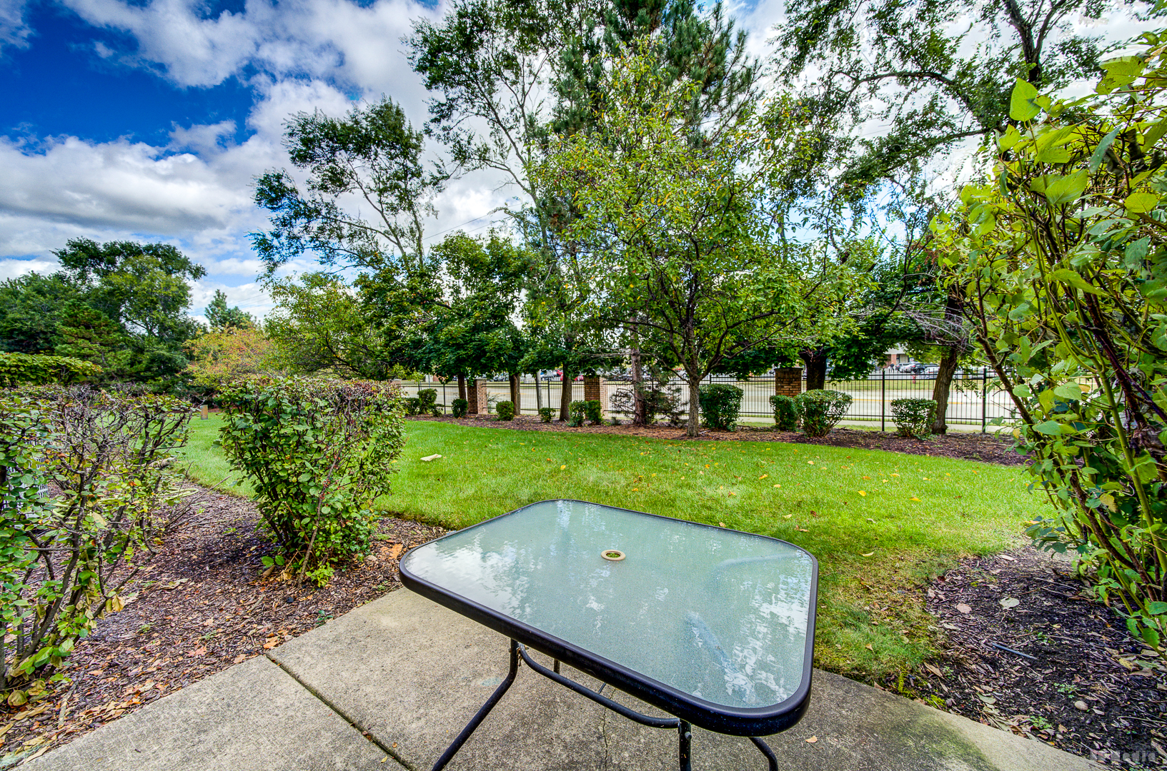 1603 Spyglass Circle Palos Heights, IL 60463 - Photo 46 of 51 a view of a table and chairs in the garden