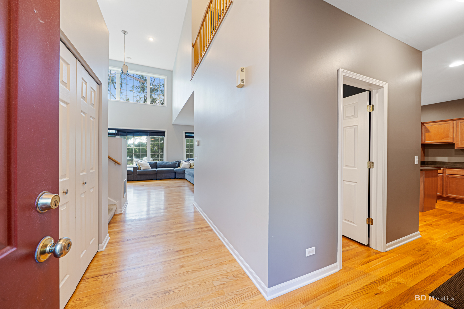1603 Spyglass Circle Palos Heights, IL 60463 - Photo 6 of 51 a view of a hallway with wooden floor windows and livingroom