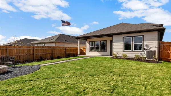 a house view with a garden space