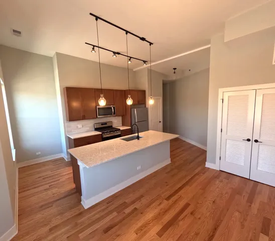 a large room with wooden floor