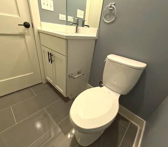 a bathroom with a sink and mirror