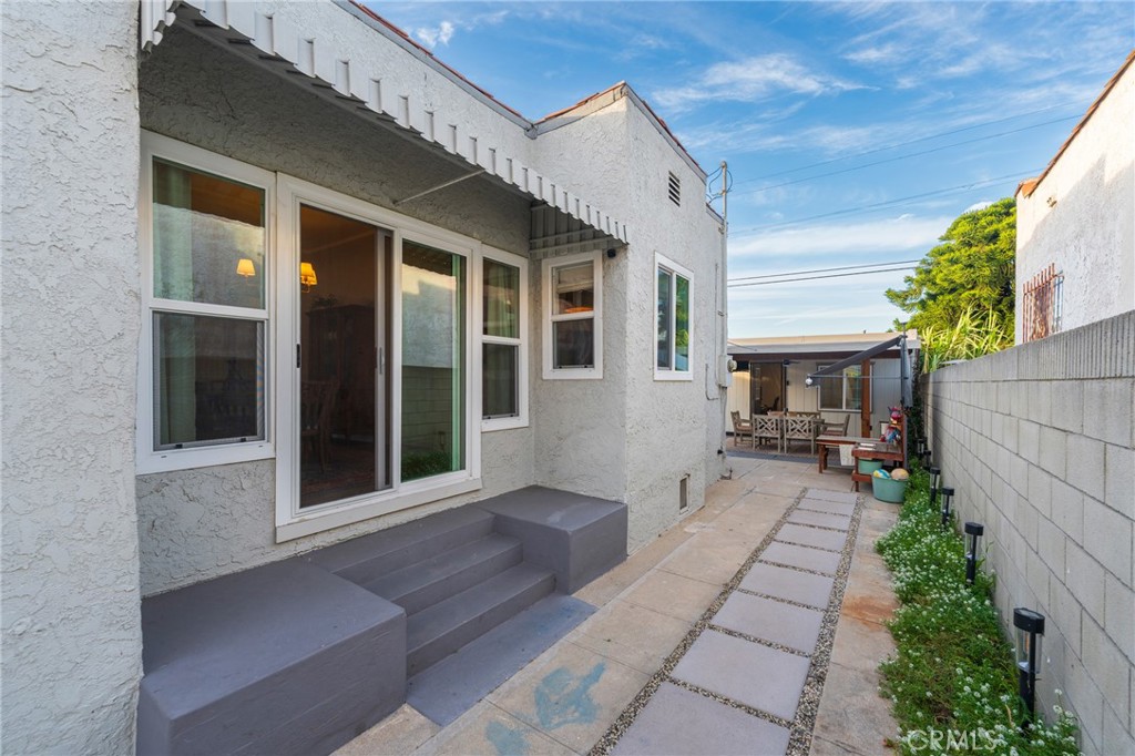 1931 West 68th Street Los Angeles, CA 90047 - Photo 26 of 29 a view of a house with sitting area