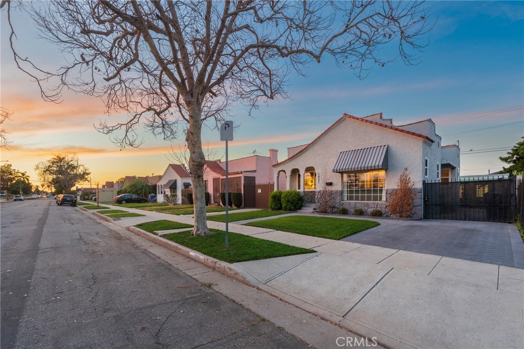 1931 West 68th Street Los Angeles, CA 90047 - Photo 27 of 29 a front view of house with yard and green space
