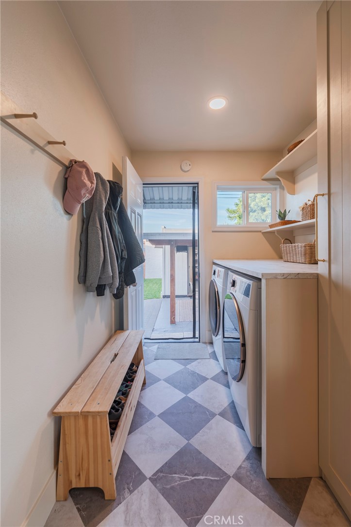 1931 West 68th Street Los Angeles, CA 90047 - Photo 5 of 29 a view of walk in closet with clothes and shoes