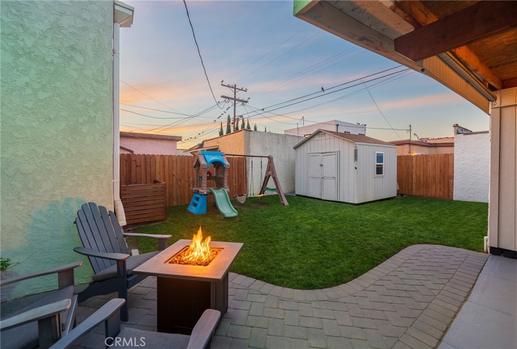 1931 West 68th Street Los Angeles, CA 90047 - Photo 7 of 29 a view of a backyard with sitting area