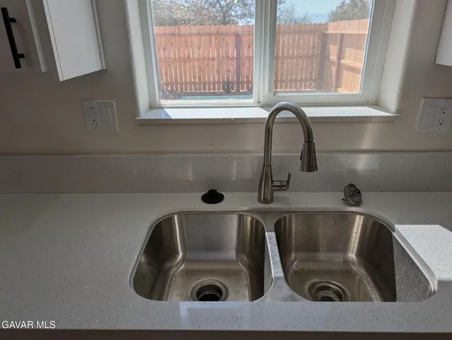 a bathroom with a sink and a bathtub