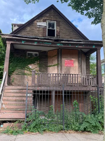 a house view with a garden space