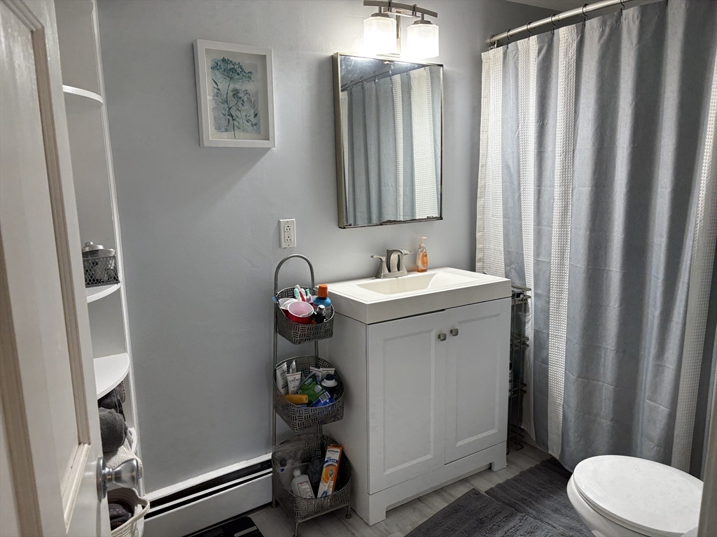 227 Union Street Northbridge, MA 01588 - Photo 11 of 21 a bathroom with a sink toilet and shower
