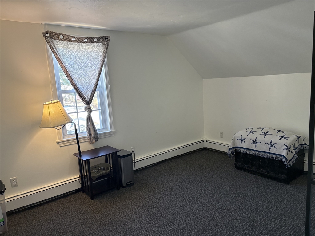 227 Union Street Northbridge, MA 01588 - Photo 16 of 21 a view of room with window and wooden floor